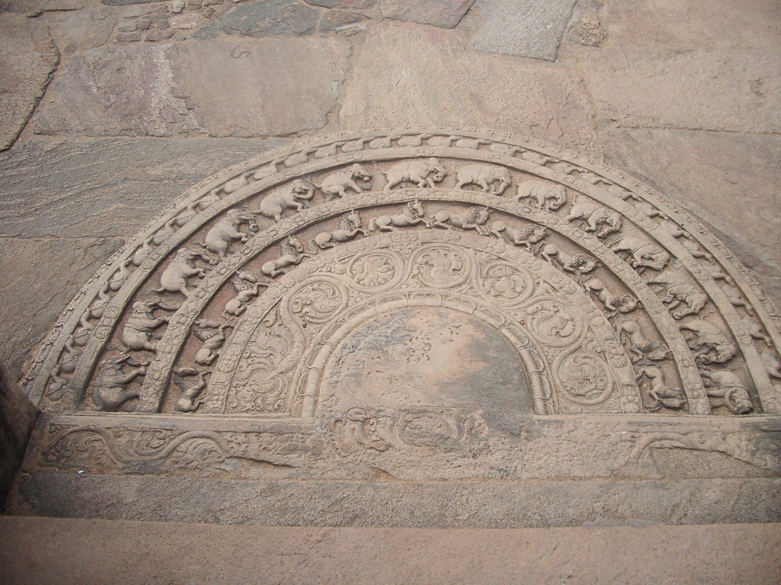 The iconic Sandhakada Pahana (moon stone) of the Polonnaruwa kingdom. Credit: Wikimedia Commons.